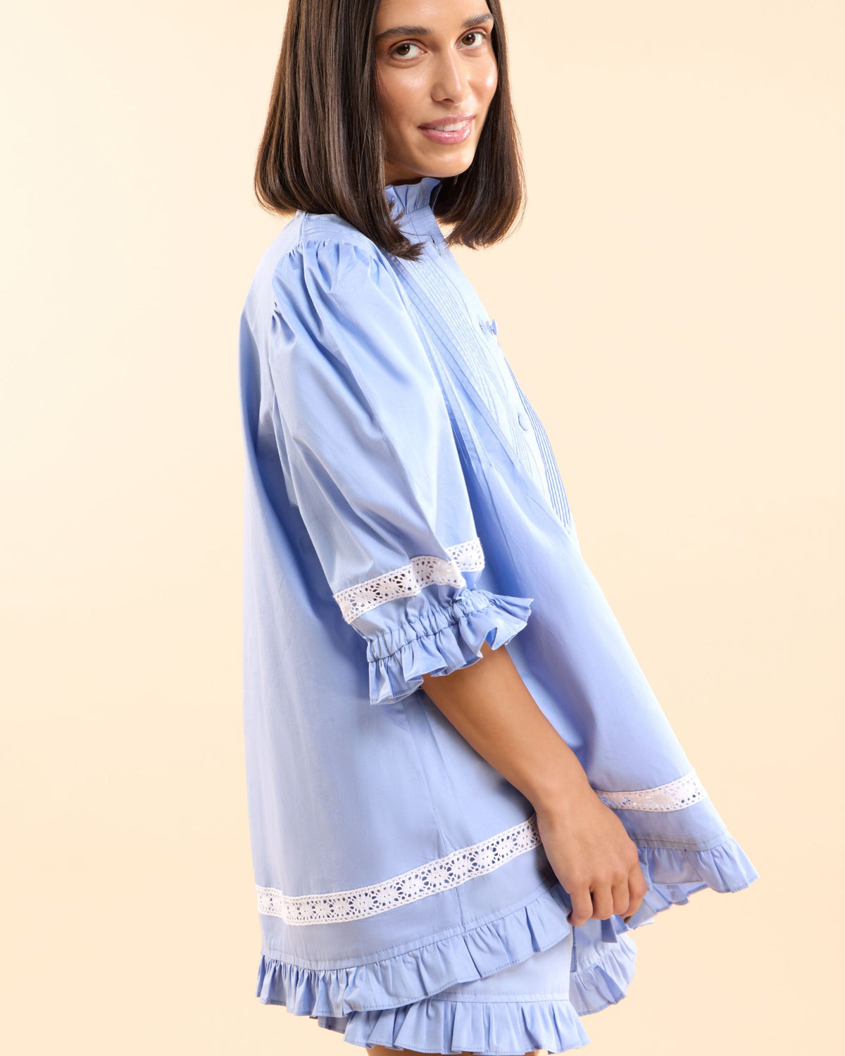 Three-quarter view of the Alma Bluebelle Set with white lace trim above the ruffled hem, Love Letters x sleepwear